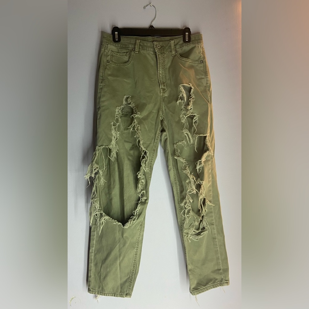 Green ripped jeans